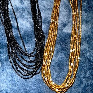 Two beaded necklaces. These make great statement piece, perfect for layering.